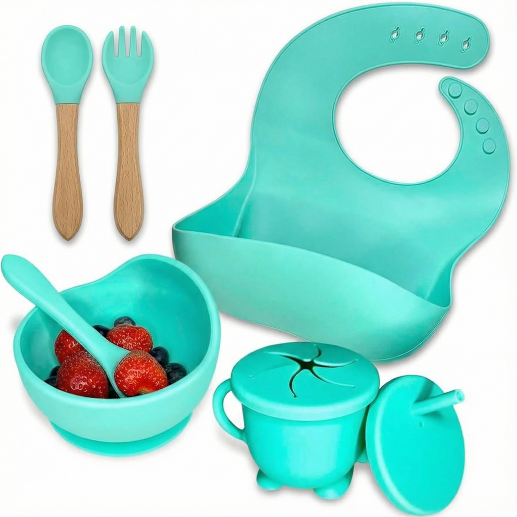 Teal silicone baby feeding set with bib, suction bowl, spill-proof cup, and wooden spoon and fork